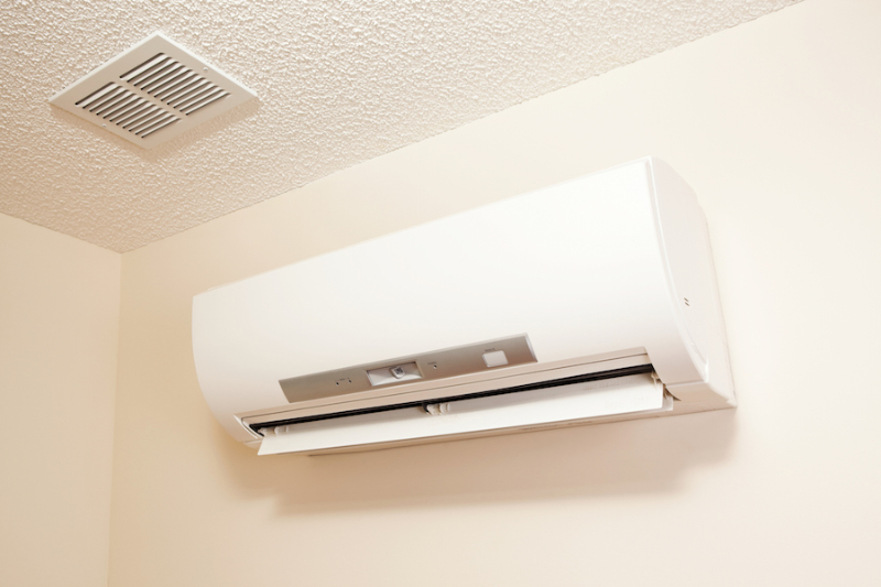 A wall-mount mini-split heating and air conditioning unit.